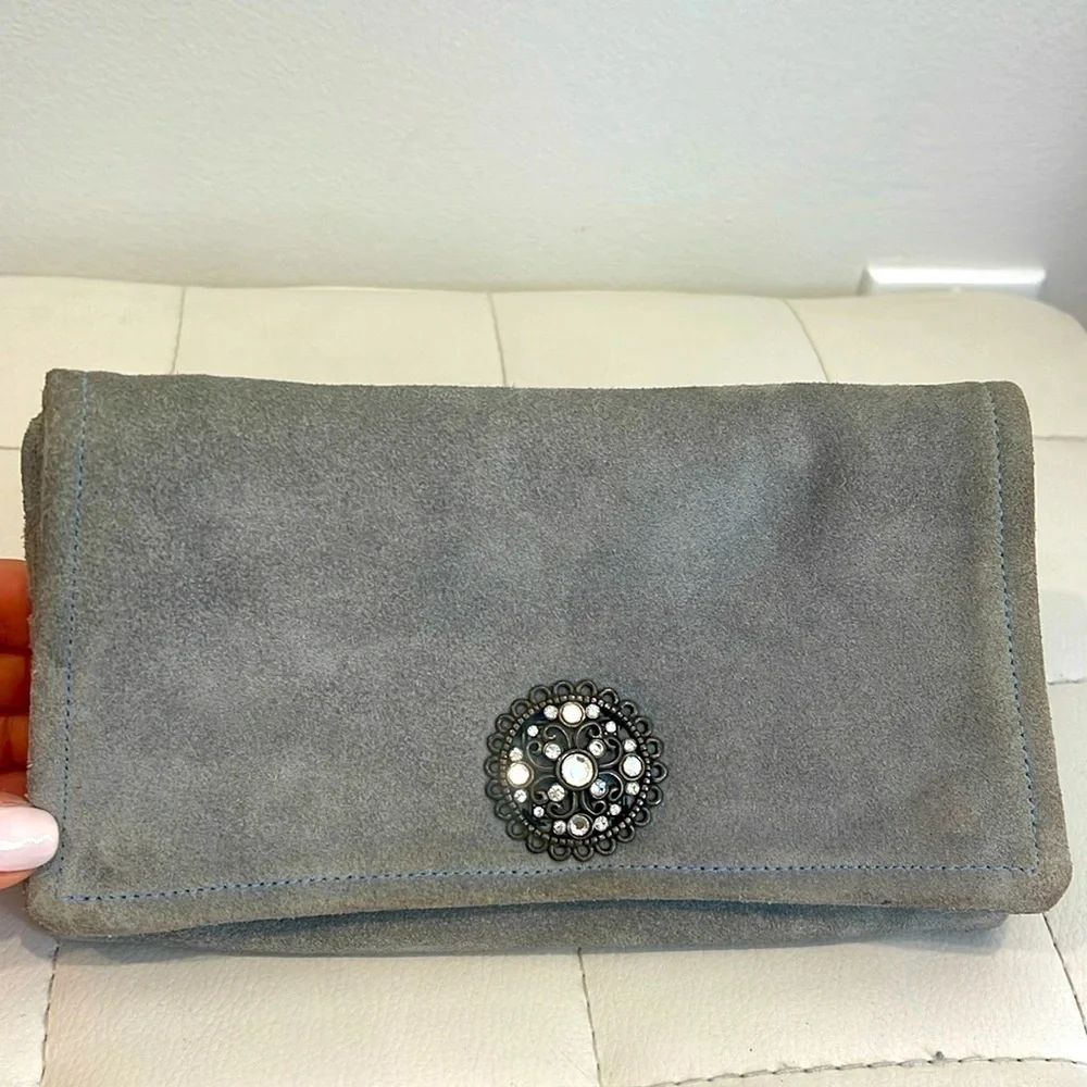 Pale blue clutch with inside zippers and vintage embellishments